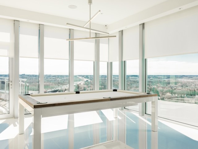 Clara indoor shades installed across large windows